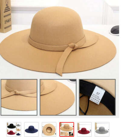 Шляпа черная, с широкими круглыми полями и овальным затылком