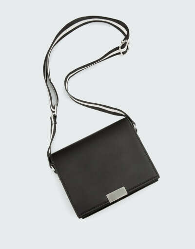 Black crossbody bag with two-tone strap