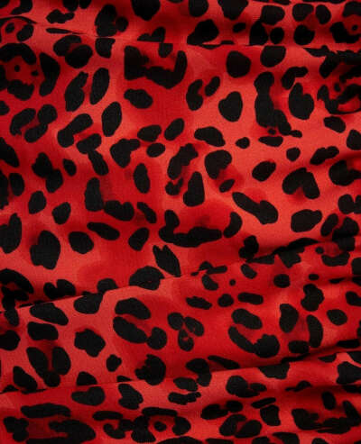 Красный леопард