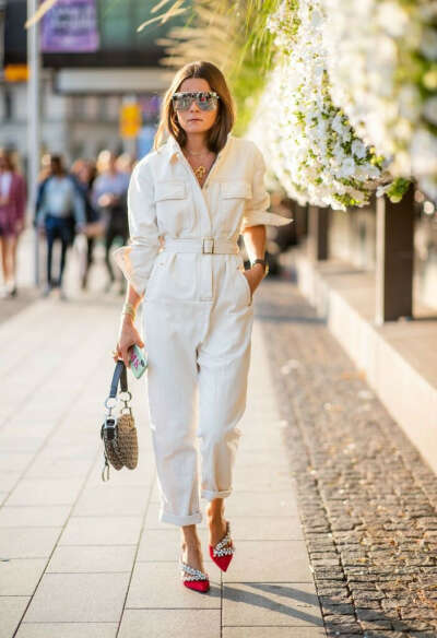 Rikke Krefting wearing white overall seen during Stockholm Runway...