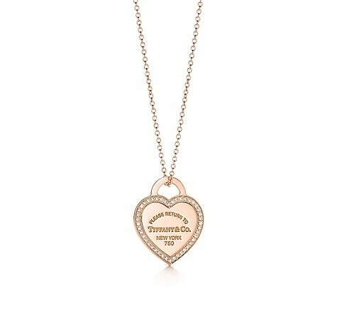 Return to Tiffany™ small heart tag pendant in 18k   gold with diamonds.