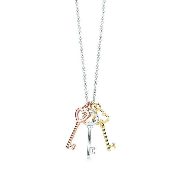 Tiffany & Co. -  Tiffany Keys mini three-key pendant in silver and 18k rose and yellow gold.